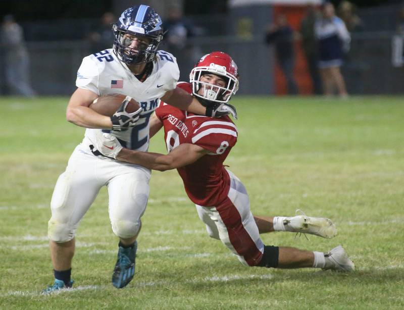 Bureau Valley's Elijah Endress pushes Hall's Braden Curran away while running past him on Friday, Sept 8, 2023 at Richard Nesti Stadium.