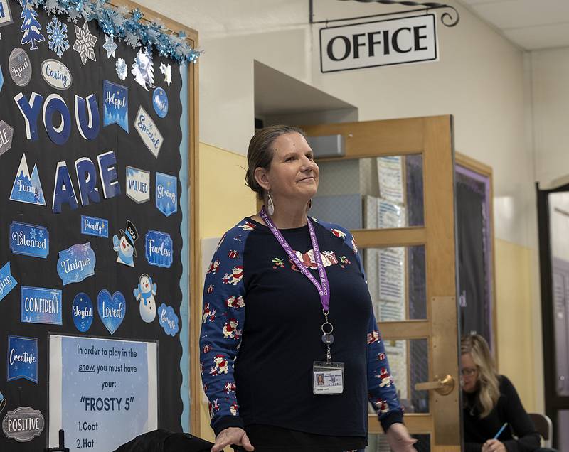 Jefferson School principal Crystal Thorpe speaks with Brett Nicklaus and Destiny McElhinney Friday, Dec. 20, 2024, about the campaign to end lunch debt.