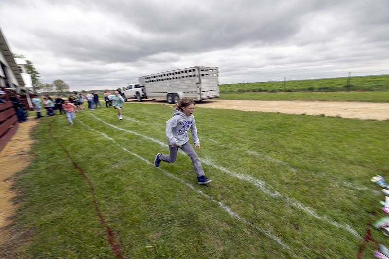 Students compete in a relay race to guess which products contain corn Friday, April 24, 2026, at the Lee County Fairgrounds.