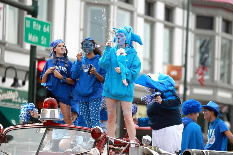 St. Charles North’s Most Spirited blows bubbles at the crowd lined up on Route 64 on Friday, Sept. 27, 2024 during the school’s annual homecoming parade in St. Charles.