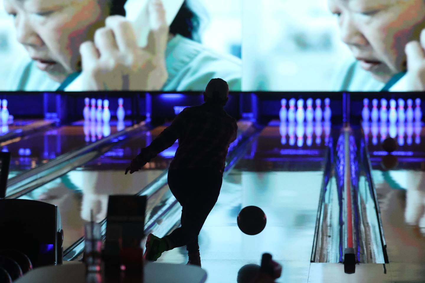 A bowler releases the ball on a night out at Twisted Pin on Friday, Dec. 1, 2023 in Plainfield.