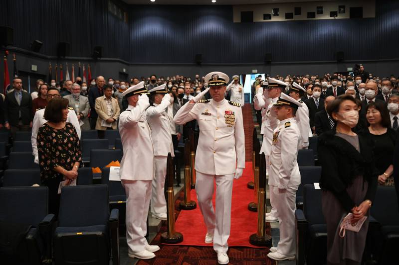 Capt. Tim DeWitt, Naval Facilities Engineering Systems Command Fast East, is relieved by Capt. Lance Flood during a change of command and retirement ceremony for DeWitt on board Fleet Activities Yokosuka, Japan, Oct. 28, 2022.