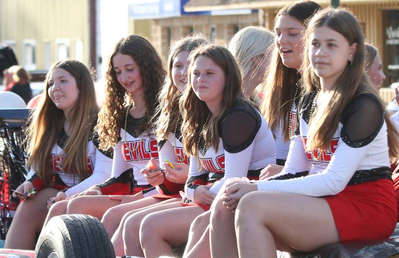 Hall High School Devilettes ride a float during the Hall High School Homecoming parade on Thursday, Sept. 28, 2023 in Spring Valley.