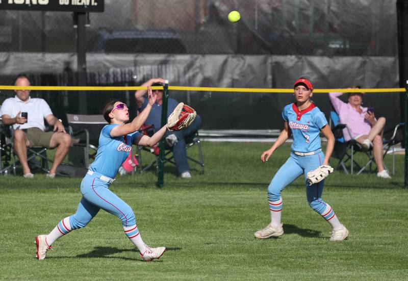 Ottawa's Avery Leigh makes a running catch Monday, May 12, 2025, during their game at Sycamore High School.