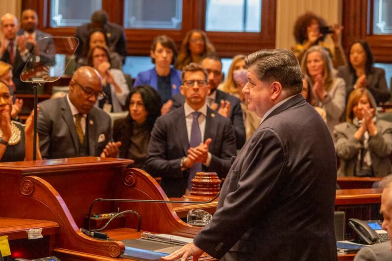 Governor JB Pritzker enters the House Chamber for his 2025 budget address