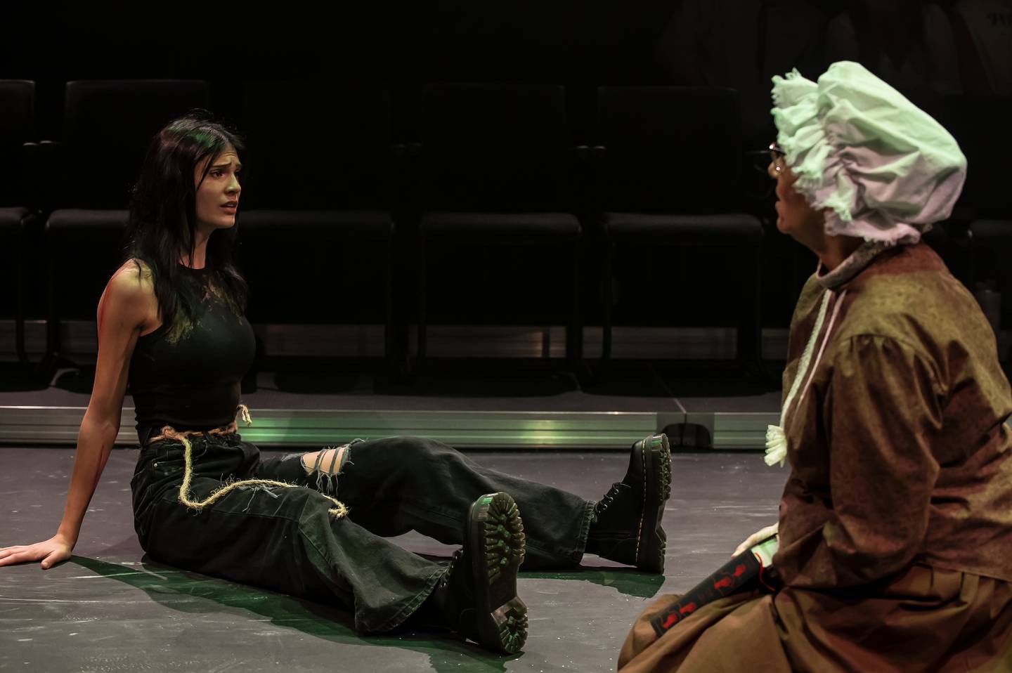 Trinity Anderson (from left) portrays The Creature, with Lucinda Nicholas as Madame Delacey in "Frankenstein."