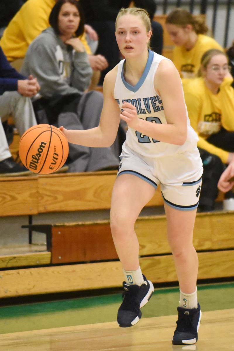 Cissna Park's Josie Neukomm pushes the ball up the floor during an IHSA Class 1A Dwight Regional semifinal against Ridgeview at Dwight Township High School Monday, Feb. 17, 2025.