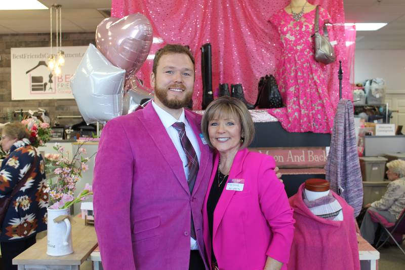 Best Friend's Consignment owner Marianne Evans, right, and her son and store manager Zack Evans celebrate 20 years of business.