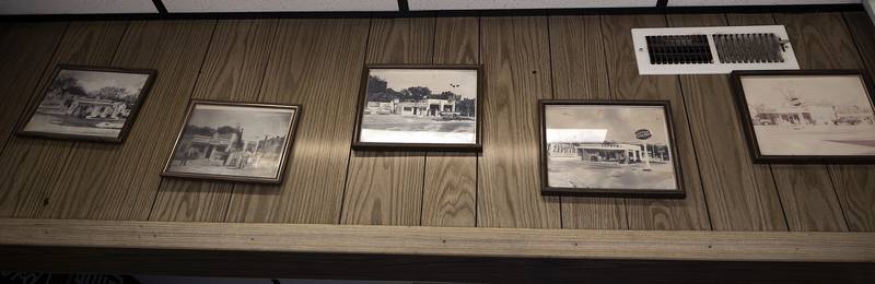 Photos of the station going back to the 1940s are shown Thursday, May 8, 2025, at Russ’ Automotive Service. The station was once a Zephyr gas station.