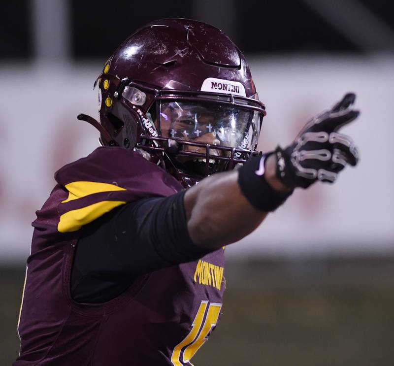 Montini's Charles Flowers celebrates after scoring a touchdown during the second quarter of the IHSA Class 4A state championship game against Rochester on Friday, Nov. 28, 2025 in Normal.