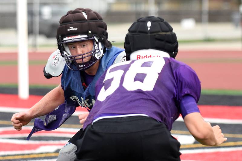 Wilmington's Declan Profitt, left, and Collin Van Duyne work through a drill ahead of the Wildcats' joint summer workout at Bradley-Bourbonnais Wednesday, July 16, 2025.