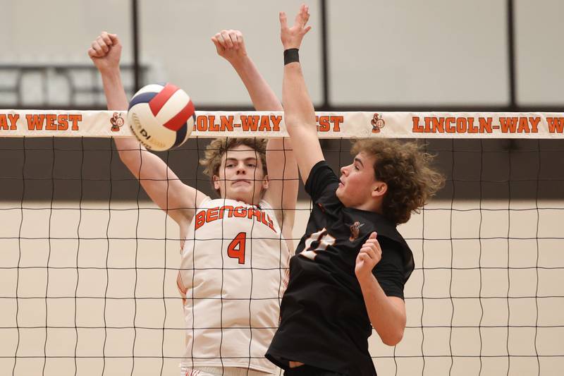 Plainfield East’s Braxton Francis beats Lincoln-Way West’s Garrett Konopack for a play on the ball on Wednesday, March 22nd. 2023 in New Lenox.