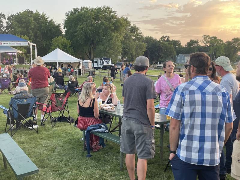 Friends gather at Petersen Park for Bands, Brews & BBQ 2023. This year's fest is Aug. 16-18, with funds raised going to McHenry Area Rotary charities.
