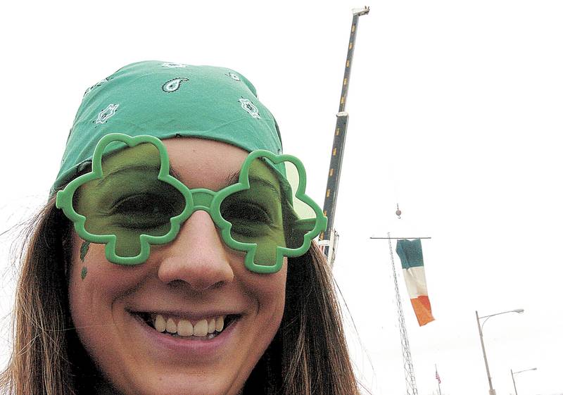 2005 File: Angie Baker of Dixon sees through clover-colored glasses in celebration of the St. Patrick's Day parade in Dixon.