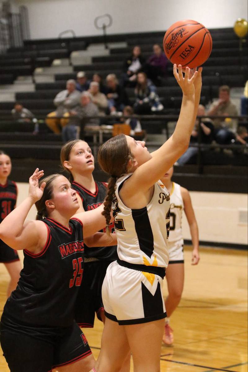PC's Avery Lenkaitis shoots for two in Tuesday's Putnam County 8th grade night. The Pumas beat Marseilles 51-15.