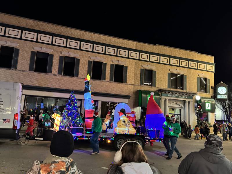 Baker Plumbing's float makes its way down Liberty Street during the annual Lighted Holiday Parade on Friday, Nov. 28, 2025.