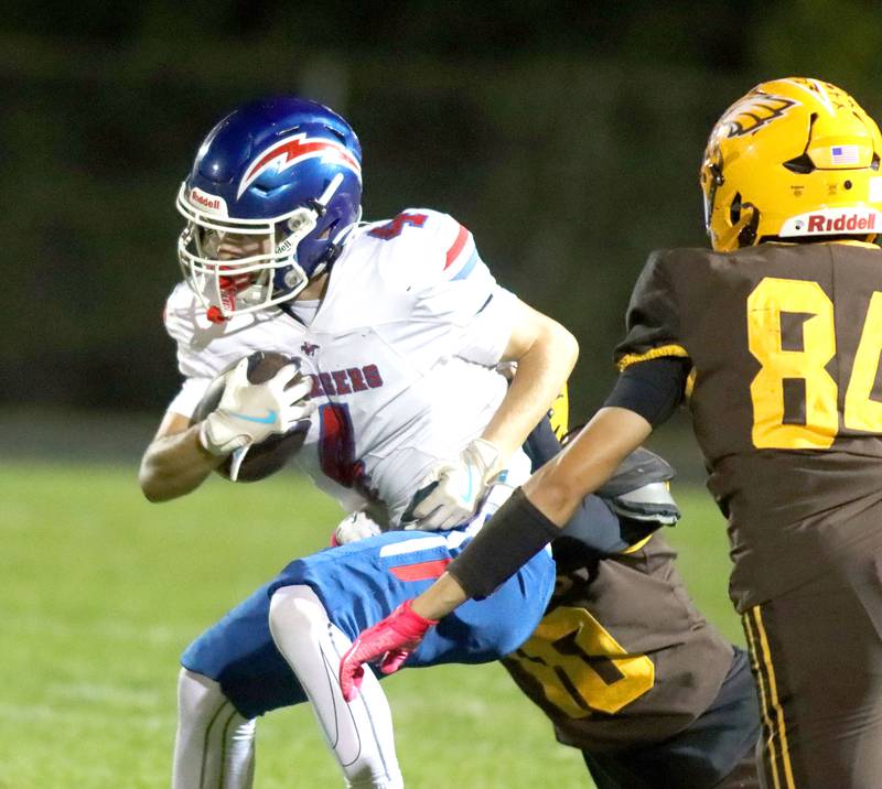 Dundee-Crown’s Ryan Pierce runs the ball  in varsity football  at Jacobs High School in Algonquin on Friday, Oct. 10, 2025.