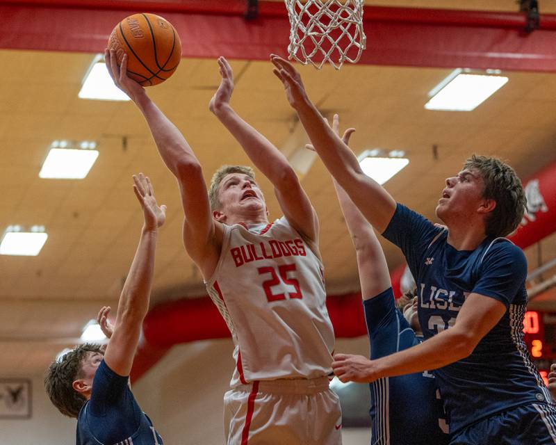 Joseph Hoekstra (25) of Streator lays up ball as Lisle's defense attempts to contest shot on Wednesday, Feb. 18, 2026 at Streator High School in Streator.
