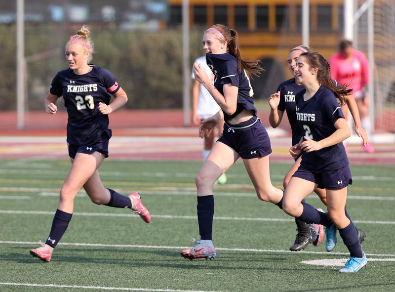 IC Catholic celebrates Allie Geiger's goal during the IHSA Class 1A girls soccer super-sectional match between Richmond-Burton and IC Catholic at Concordia University in River Forest on Tuesday, May 23, 2023.