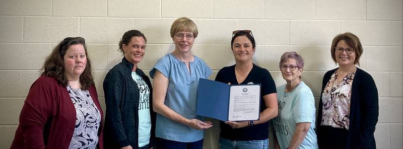 Sterling Mayor Diana Merdian (fourth from left) presents a proclamation supporting Pride Month. She is pictured with (from left) Layla Krzykowski, Ashleigh Keime, PFLAG Sauk Valley President Sarah Schlegel, Cat Clarke and Tammy Stewart.