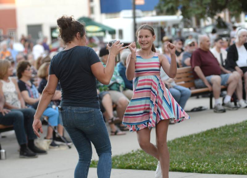 The grassy arear in front of the bandshell provides a good place to dance as evidenced by these two fans who enjoyed music by Jonny Lyons and the Pride at the Mt Morris Jamboree on Friday, June 27, 2025.