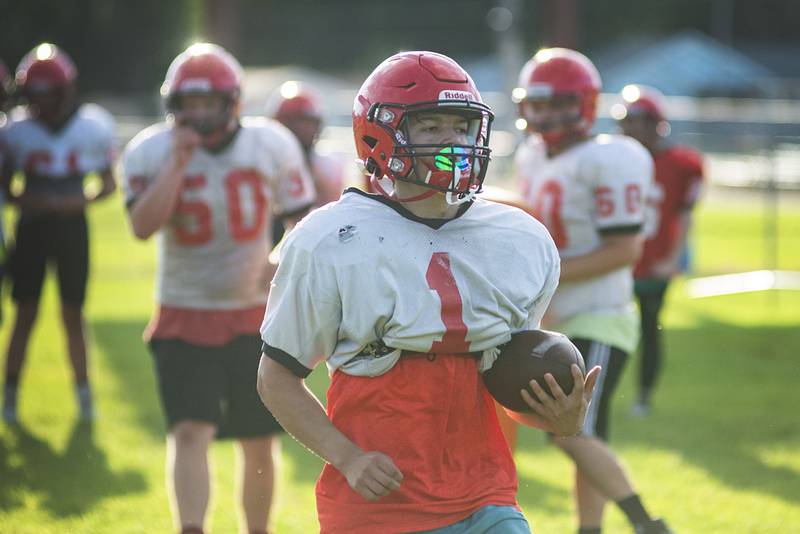Amboy players run through drills Thursday, July 28, 2022 at the high school. First day of IHSA football practice is just over a week away for local teams.