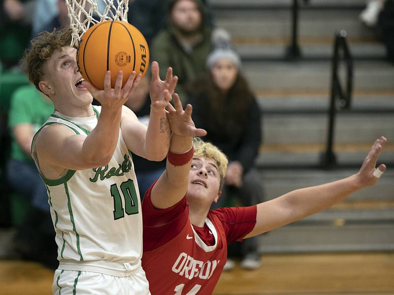 Rock Falls’ Kuitim Heald puts up a shot against Oregon’s Kade Girton Friday, Jan. 10, 2025, at Rock Falls High School.