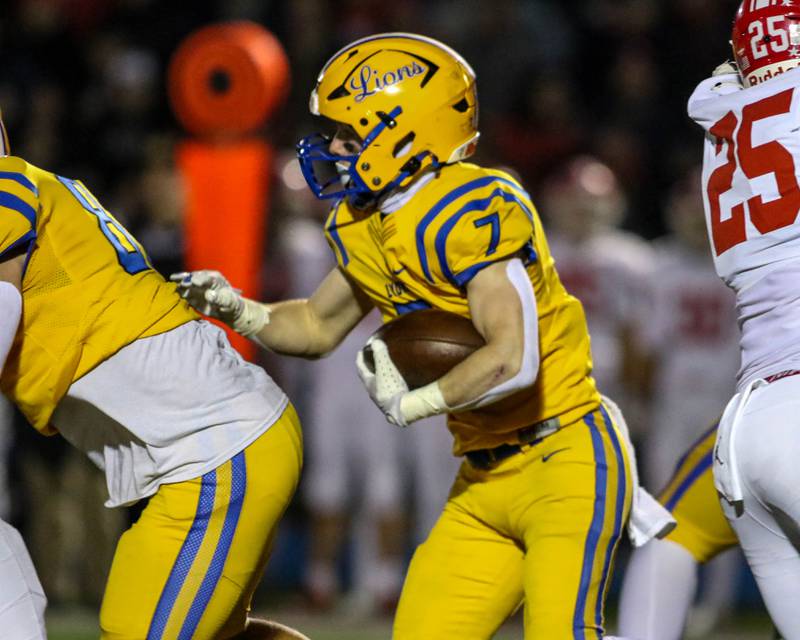 Lyon's Danny Carroll (7) follows his blocker during Class 8A quarterfinal football game between Naperville Central at Lyons on Friday, Nov 15, 2024  in Western Springs.