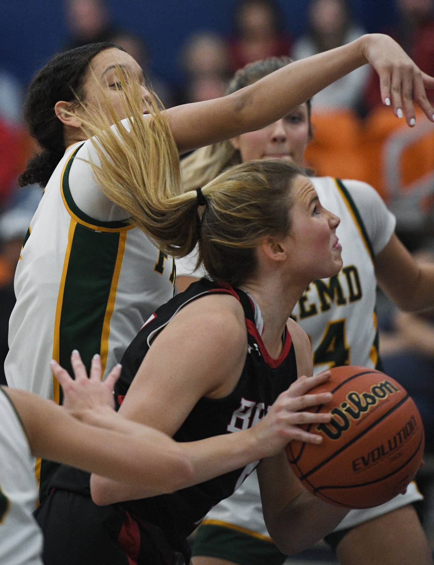 John Starks/jstarks@dailyherald.com
Fremd’s Coco Urlacher tries to block the shot of Benet’s Lenee Beaumont in the semifinal game of the Morton College girls basketball tournament in Cicero on Thursday, December 29, 2022.