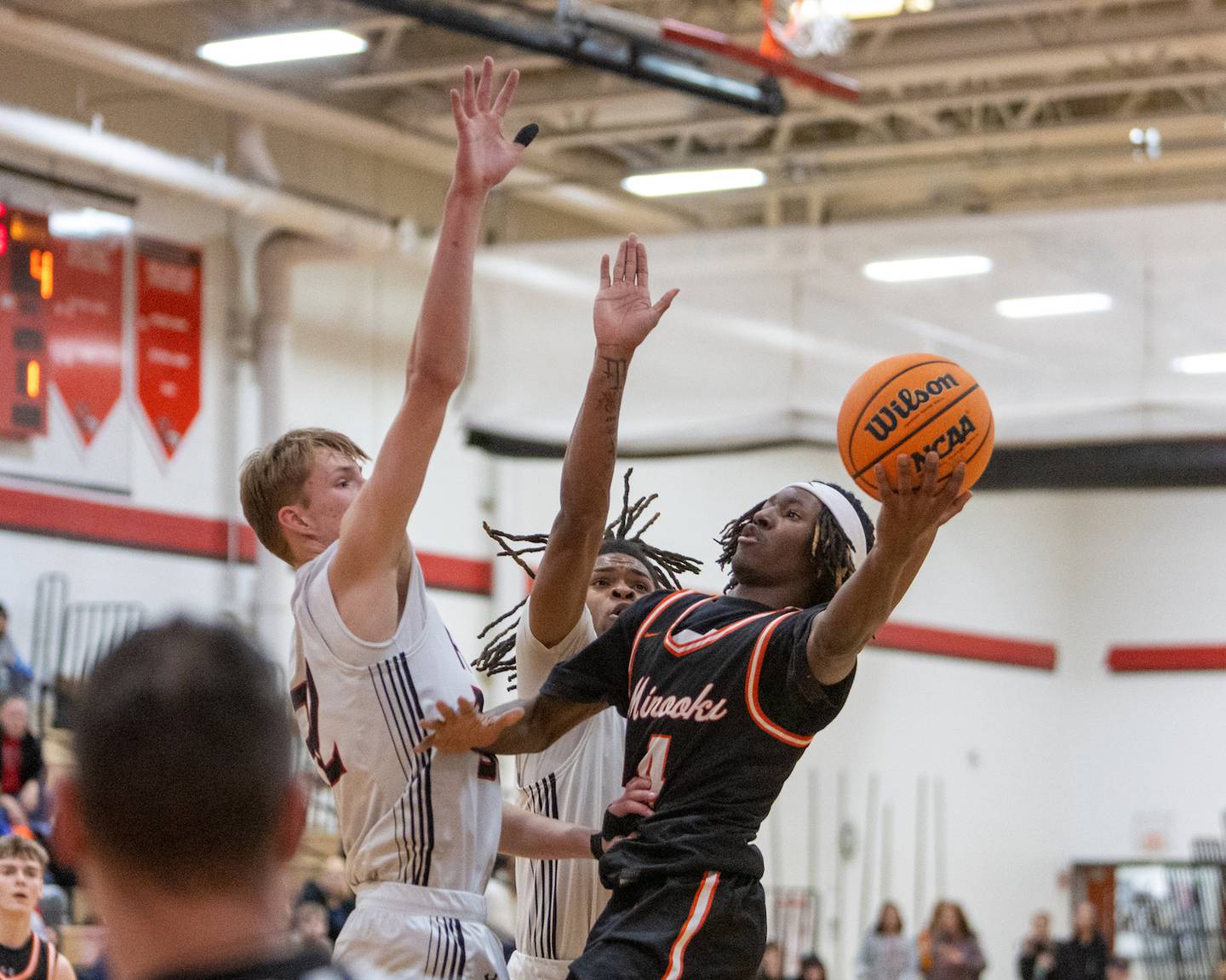 Minooka's Nehemiah Brown goes in for the shoot against Yorkville on Thursday, Jan.22,2026 in Yorkville.