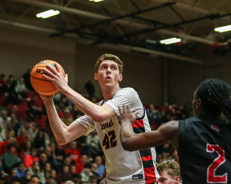 Benet's Colin Stack (42) handles the ball during their Class 4A Bolingbrook Sectional semifinal basketball game between Yorkville at Benet, March 3, 2026 in Bolingbrook.