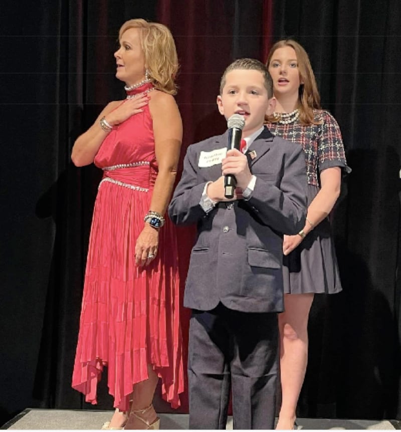 Marquette Academy second grader Jonathan Findley, son of La Salle County Board Member Beth Findley Smith, R-Somonauk, and Michael Findley, led the “Pledge of Allegiance” at the inaugural Illinois Republican Party Bank Your Vote Gala in Rosemont this past weekend.