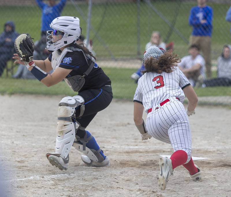 Fulton’s Madison Bolton slides in safe at home for the game winning walk-off run against Newman Tuesday, May 19, 2026, at the Class 1A softball regionals at Newman.