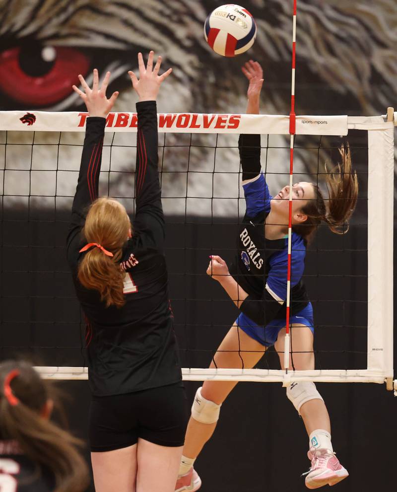 Hinckley-Big Rock's Courtlyn Brockway tries to spike the ball by Indian Creek's Makayla Bateman during their Class 1A regional play-in game Monday, Oct. 28, 2024, at Indian Creek High School in Shabbona.