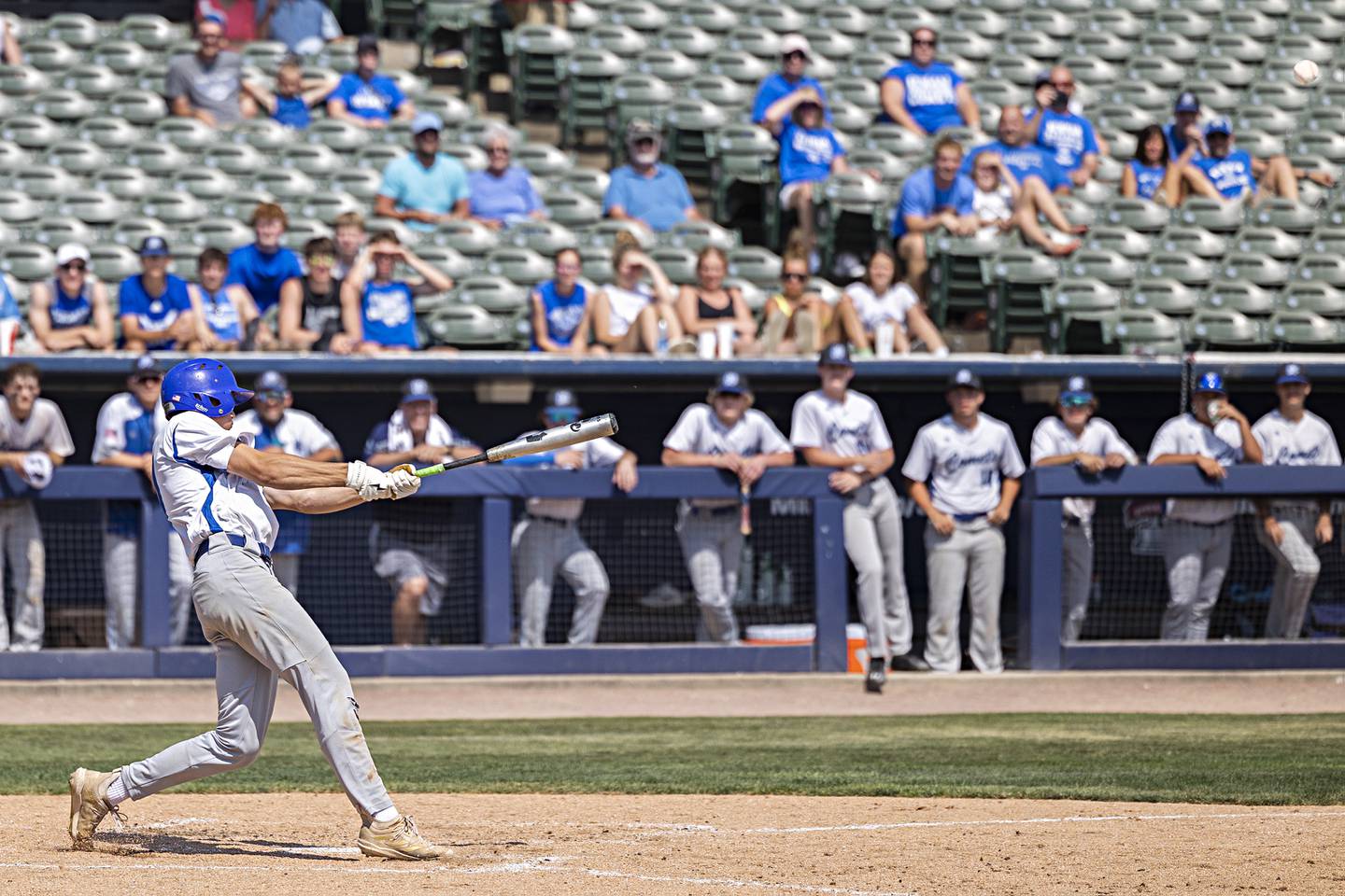 Newman’s Brendan Tunink drives the ball deep for an inside the park home run against Goreville Saturday, June 3, 2023 during the IHSA class 1A third place baseball game.