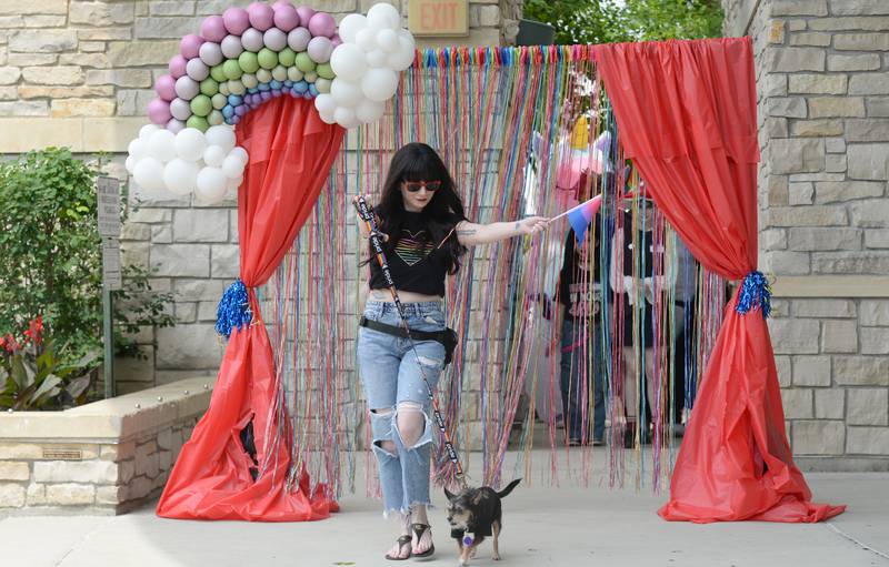 Kerry Lennon of Clarendon Hills and her dog Nova participate in the pet and person parade during the Downers Grove Pride Fest Saturday June 7, 2025.