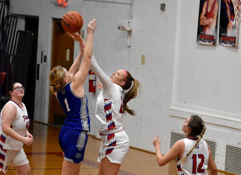 Morrison’s Camryn Veltrop blocks the shot of a Newman opponent during a game on Wednesday, Jan. 31, 2024 in Morrison.