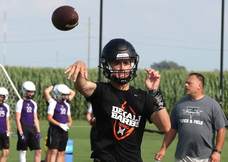 DeKalb’s Cole Latimer throws a pass Tuesday, July 16, 2024, during their matchup with Woodstock North in the Kaneland 7-on-7 at the school in Maple Park.