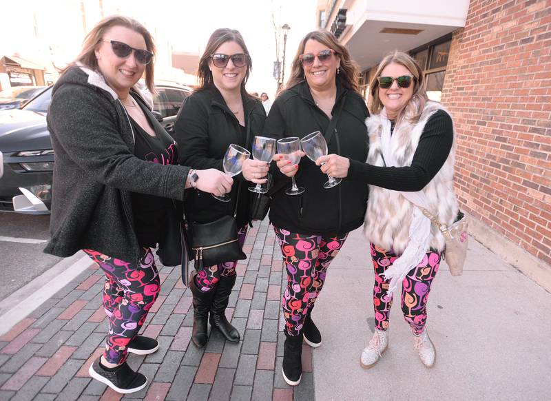 Friends (left-right) Michelle Mielke of Chicago, Liz Berg of Westmont, Nicole Torres of South Elgin, and Lisa Lindsey of Bartlett dress the part while attending another year of the Winter Wine and Cheese Walk in Wheaton Saturday, Feb 3, 2024.