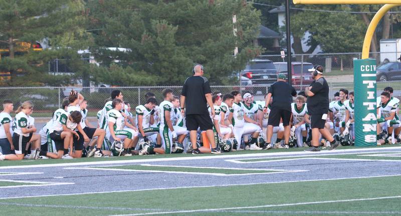 St. Bede football players huddle before playing Tuscola on Friday, Aug. 25, 2023 at Tucci Stadium in Bloomington.