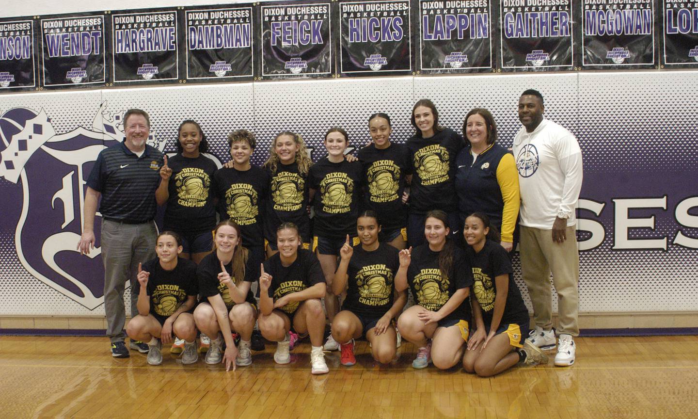 The Sterling Girls Basketball team poses with their tourney shirts . The Sterling Golden Warriors played  the Byron Tigers in the championship game of the Dixon Holiday Tournament at Dixon High School on Monday, December 29th, 2025.