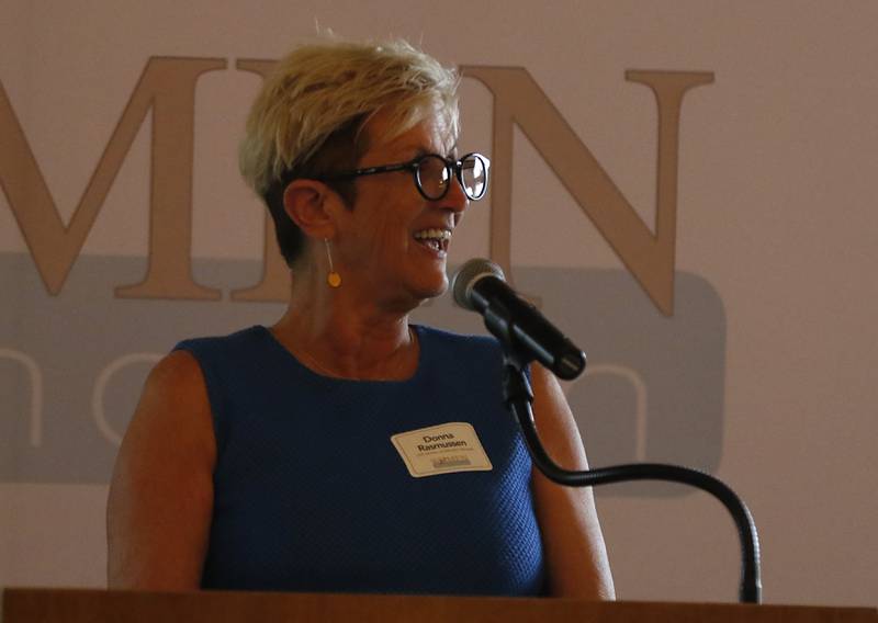 Award recipient Donna Rasmussen speaks during the Northwest Herald's Women of Distinction award luncheon Wednesday June 4, 2025, at Boulder Ridge Country Club, in Lake in the Hills. The luncheon recognized ten women in the community as Women of Distinction.