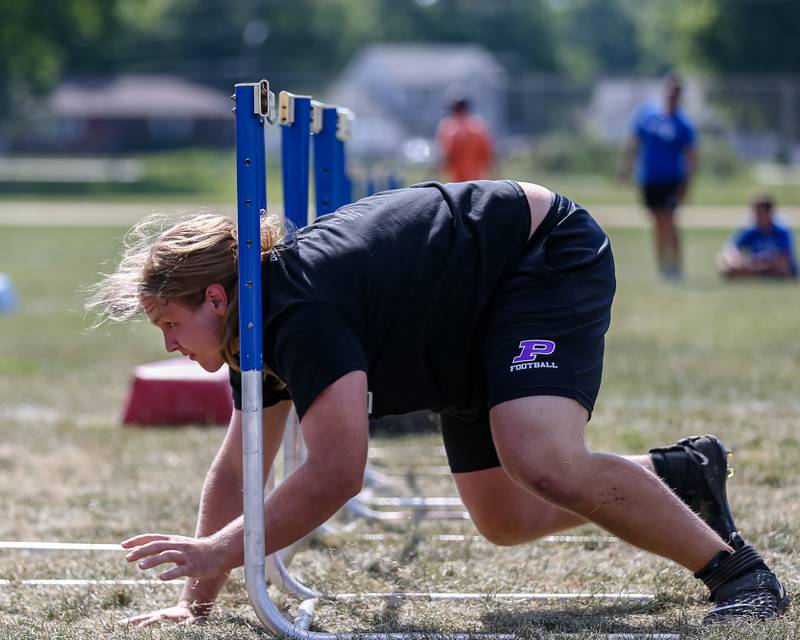Plano goes through agility drills at the West Aurora High School Battle of the Big Butts Linemen Challenge.  July 14, 2022.