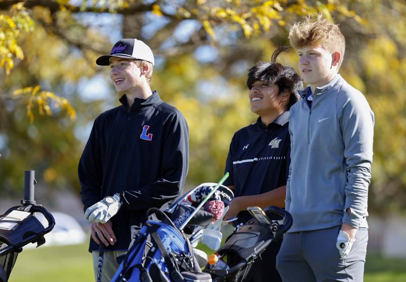 Henry Samulak of Lakes, Ryan Porter of Grayslake North, and Nate Frost of Johnsburg wait to tee off at the IHSA Class 2A Kaneland boys golf sectional  Monday, Oct. 7, 2024 at at Hughes Creek in Elburn.