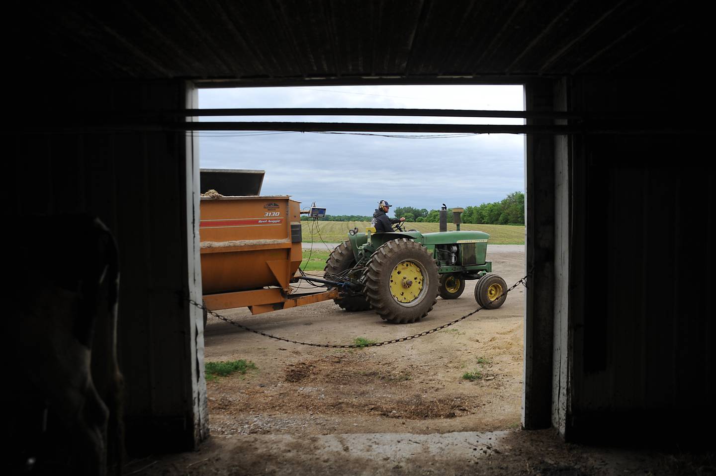 A wagon is moved Wednesday, June 1, 2022, on the Ziller family dairy farm, 13704 Adamson Road in Huntley. The farm is one of about 20 dairy farms left in McHenry County.