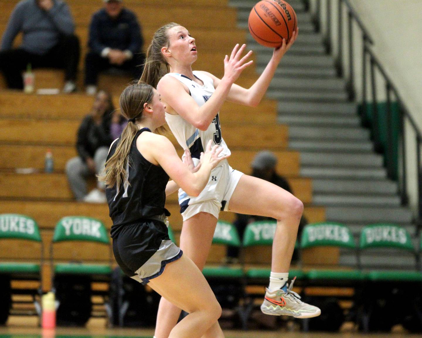 Downers Grove South’s Emily Petring (3) goes up for a shot during a game against Oswego East in the 11th Annual Thanksgiving Tournament at York Community High School in Elmhurst on Monday, Nov. 14, 2022.