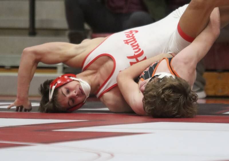 Huntley’s Matt Keaty, top, battles Crystal Lake Central’s Richie Butler at 144 pounds in varsity wrestling on Friday, Dec. 13, 2024 at Huntley High School in Huntley.