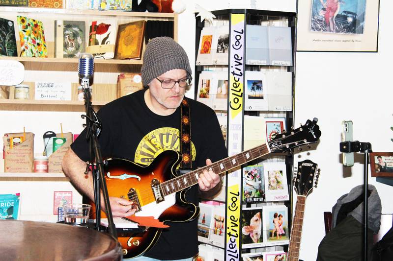 Todd Lorenc performs a concert Feb. 15, 2025 at Books on First in downtown Dixon. Whether it’s at music venues with crowds, or in front of shoppers at stores, Lorenc hopes his music makes people come home with something to think about, he said.