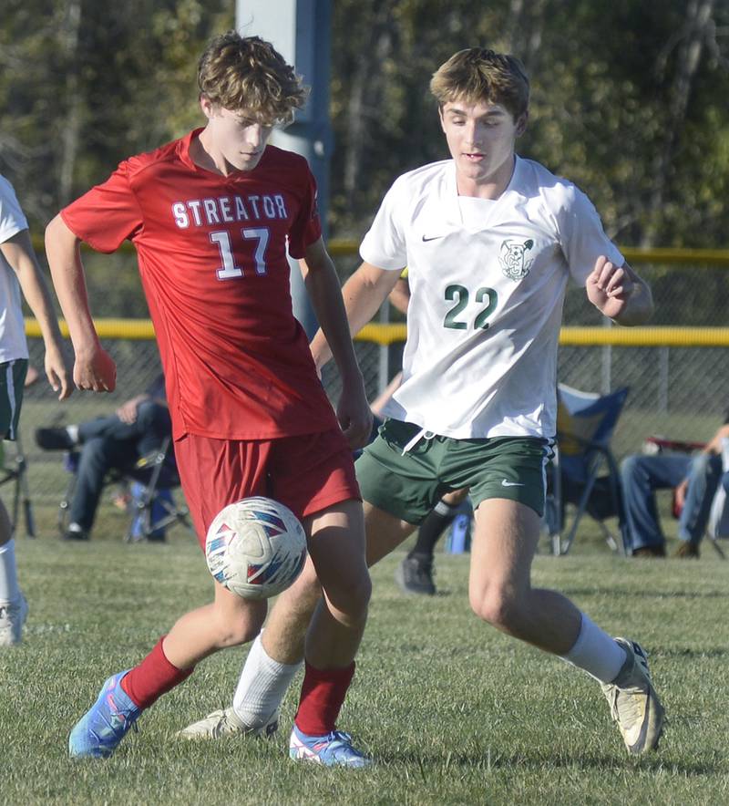 Streator’s Dalton Sliker gets the ball ahead of Coal City’s Parker Jacovec the 1st half Tuesday at Streator