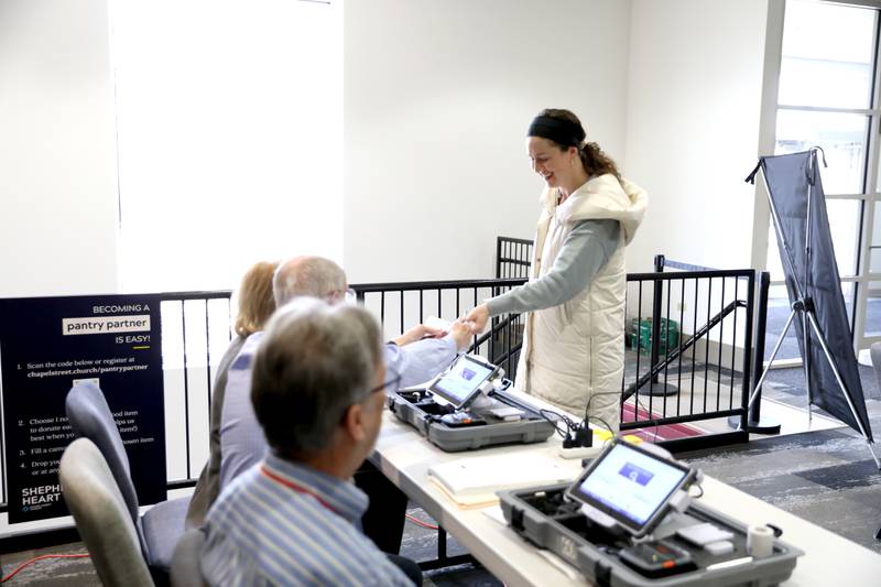 Caley Preyss of Geneva prepares to vote in the 2025 Consolidated Election on Tuesday, April 1, 2025 at Chapelstreet Church in Geneva.
